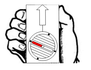 An illustration showing the compass being held so the red part of the needle points to N on the housing.