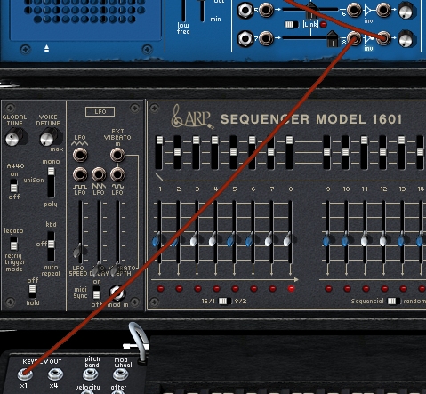 Part of the ARP2600V's front panel showing a patch cable running from the x1 KEYB CV OUT jack to one of the voltage process B inputs, with the inverter activated and the slider pushed all the way to the right.